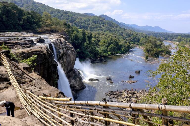 Wooden Railing along the edges of Athirapally Waterfalls